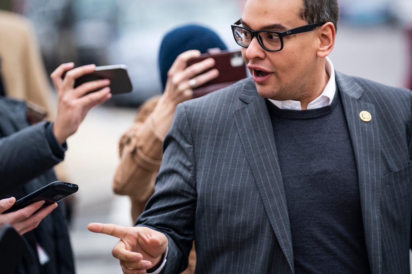 Congressman George Santos faces ethics probe and calls for expulsion while newcomer Zak Malamed raises impressive funds.
