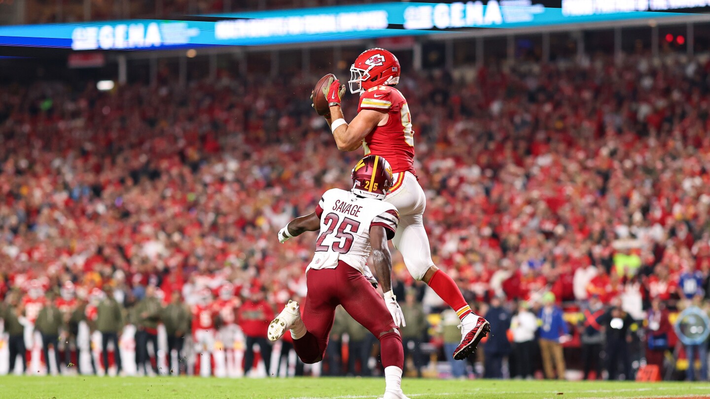 Travis Kelce Ties Chiefs TD Record in Showdown with Mahomes' Support