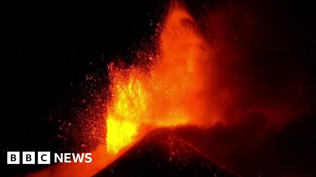 "Fiery Spectacle: Mount Etna's Nighttime Eruption Illuminates the Sky"