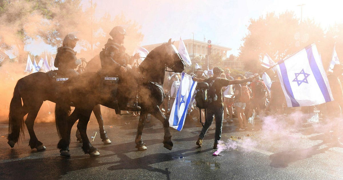 Protesters Injured and Arrested as Police Deploy Water Cannon at Knesset Vote