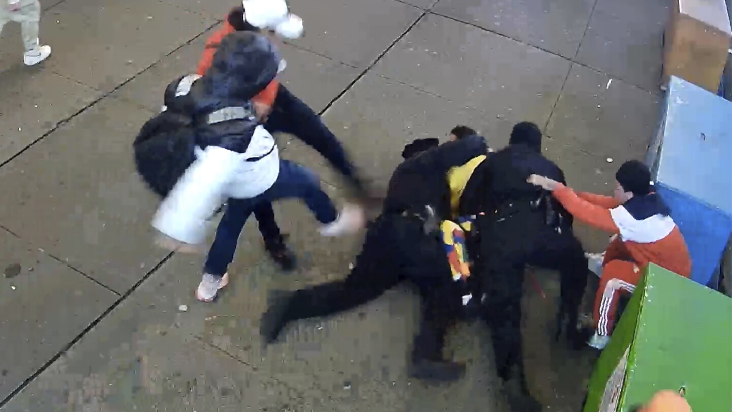 Featured image for "Chaos in Times Square: Bodycam Footage Reveals Violent Attack on NYPD Officers by Migrants"