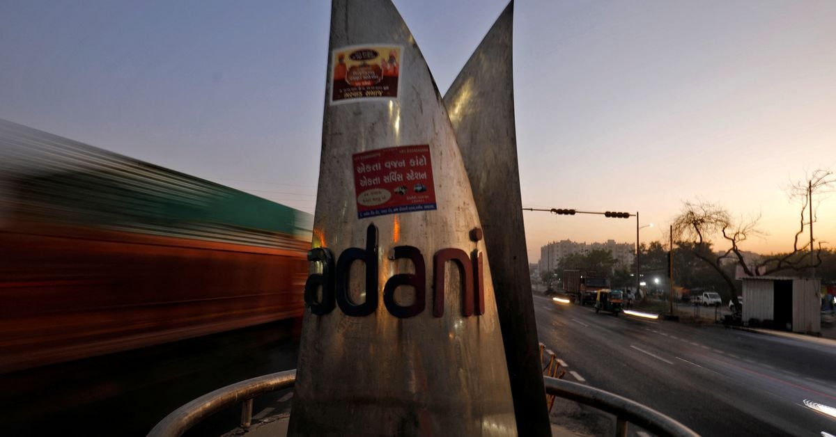 Featured image for Adani Group Stocks Plunge as Auditor Resigns Amid Hindenburg Report