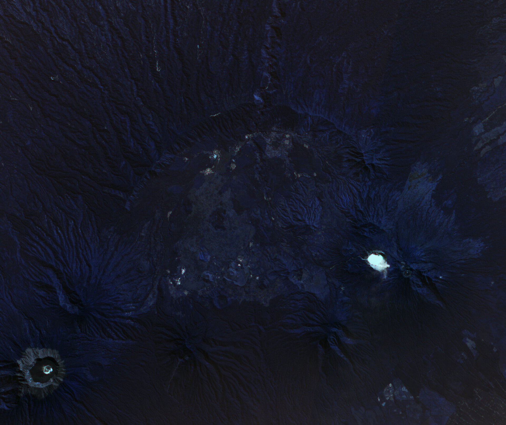 Featured image for "Spooky Sights: Acidic Lake and Volcano Spewing Eerie Blue Flames"