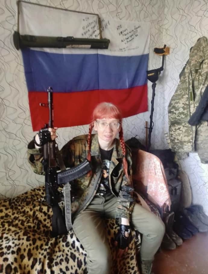 Former Kyiv University Teacher Suspected of High Treason Flaunts Russian Tricolour in Controversial Photo