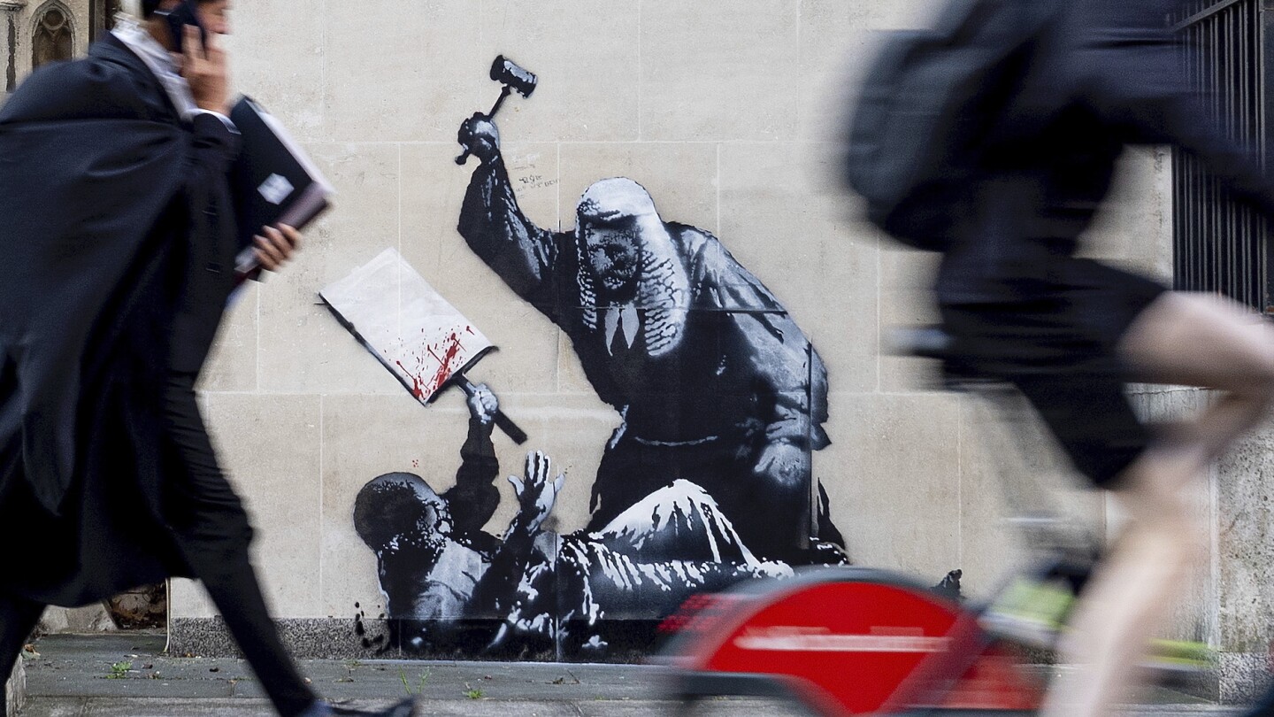 Featured image for Banksy's Courtroom Mural Removed Amidst Criminal Damage Investigation