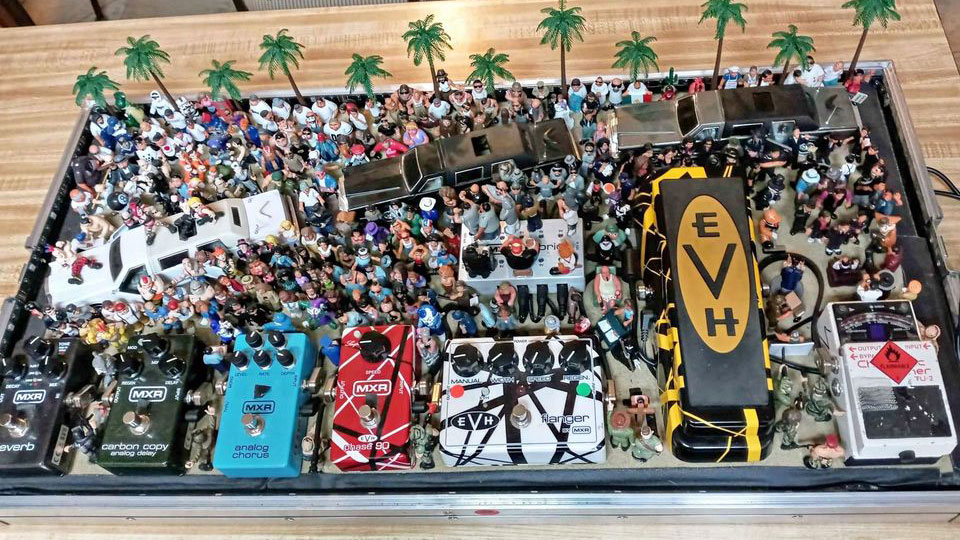 Featured image for Guitarist transforms pedalboard into epic concert diorama with $3k worth of figurines.