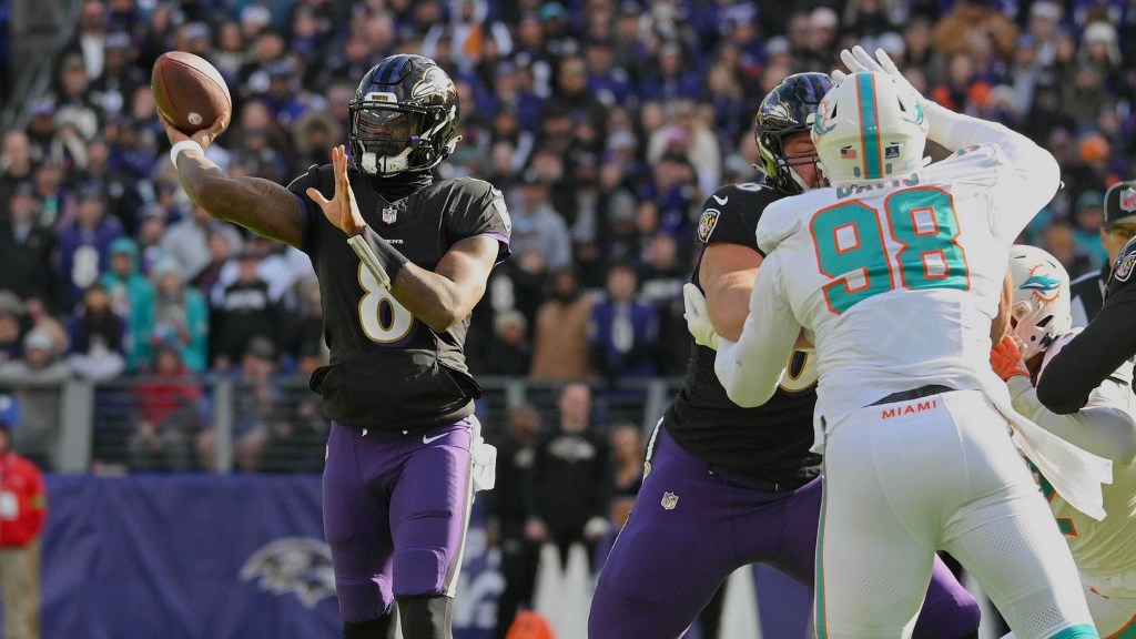 "Ravens Dominate Dolphins, Jackson's 5 TDs Secure AFC Top Seed and MVP Buzz"